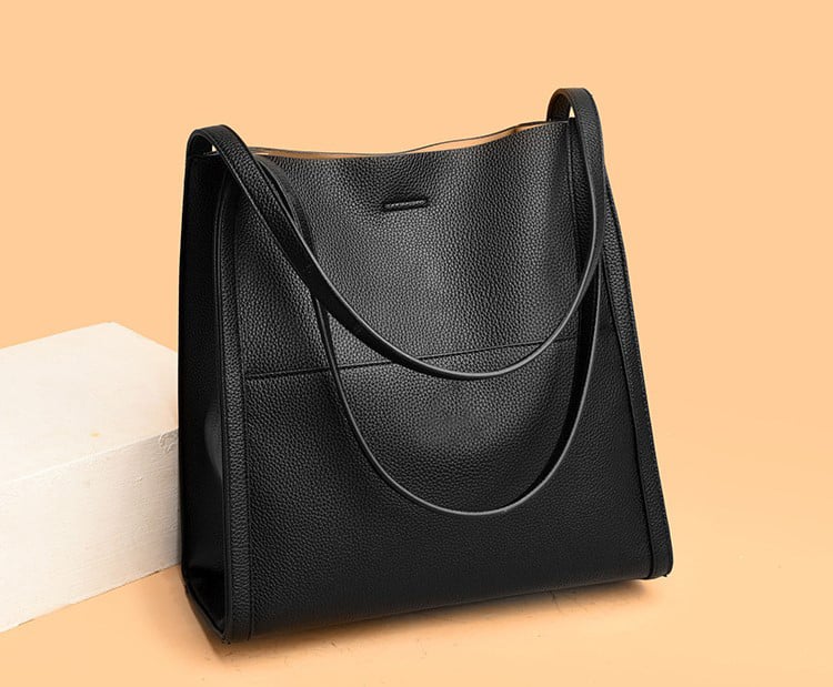 Corinne™ - Elegante en ruime leren schoudertas