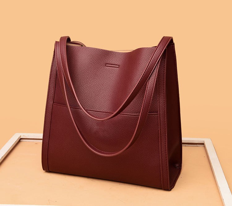 Corinne™ - Elegante en ruime leren schoudertas