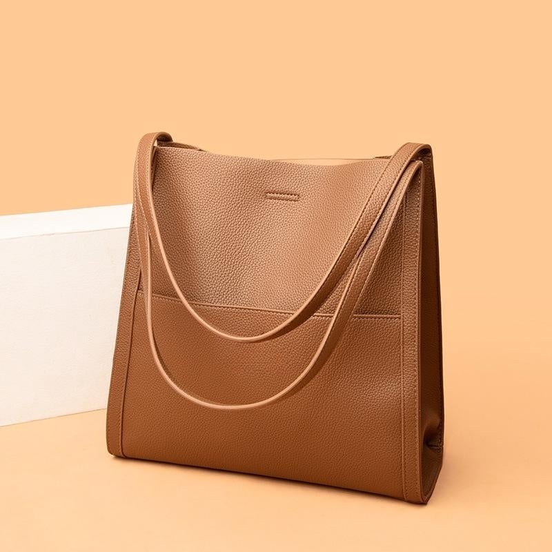 Corinne™ - Elegante en ruime leren schoudertas