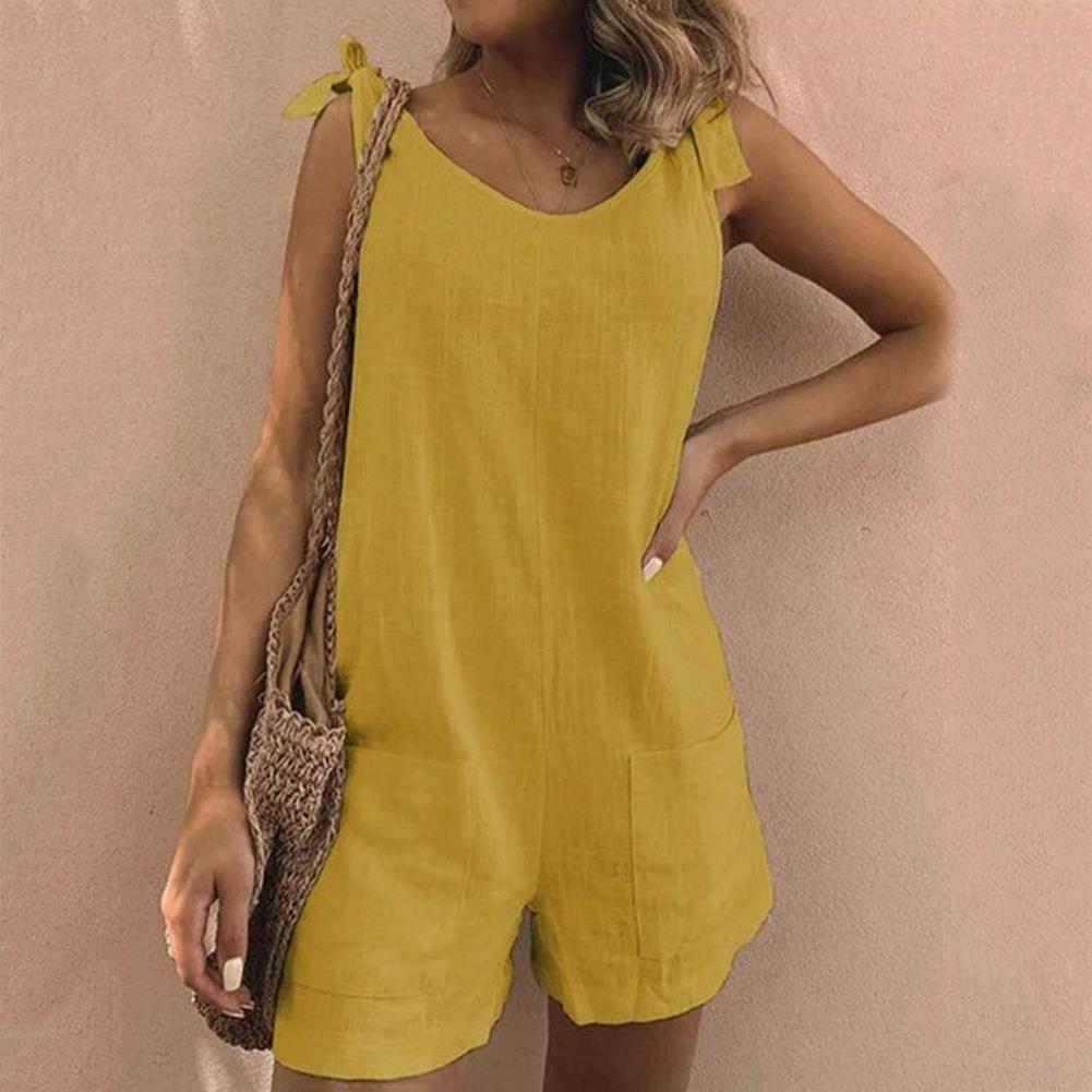 Thessara™ - Jumpsuit met strikbandjes en zakken