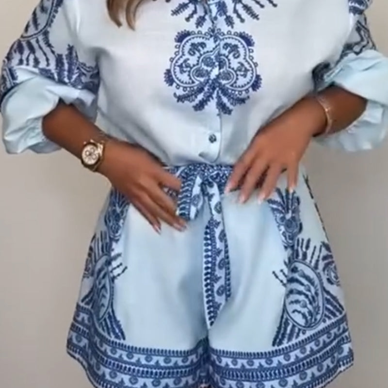 Mylene™ - Geprinte playsuit met strikceintuur